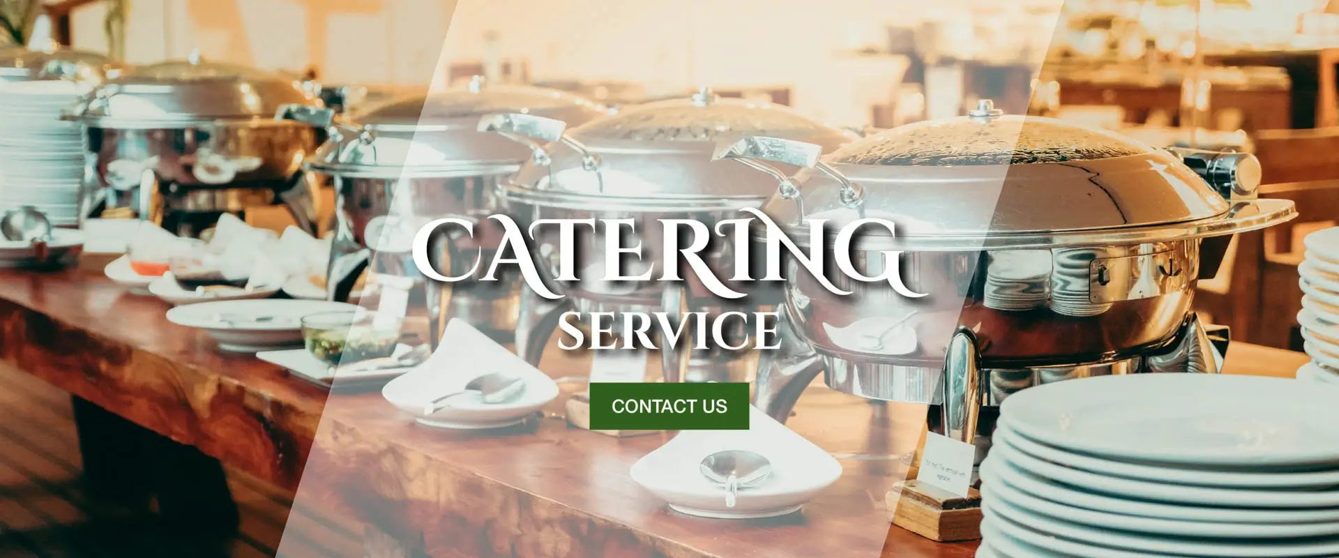 Professional catering buffet with chafing dishes, warming trays and a full food service line